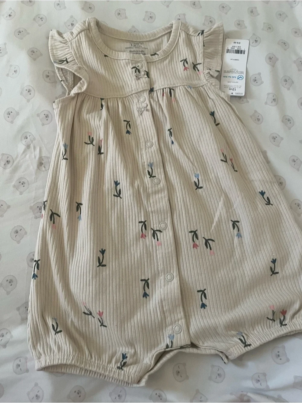 2 Carter's Ribbed Romper and a Cloud Island Romper size 12m